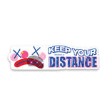 Shortcut Lab ‘Keep Your Distance’ reflective car sticker featuring a cartoon clown face with crossed-out eyes and blue-pink typography
